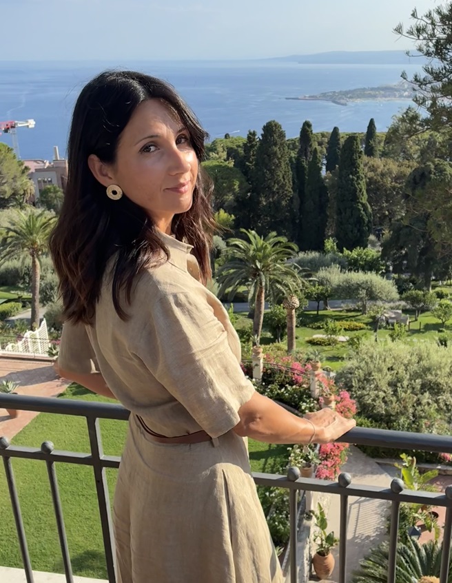 Martina Lo Magno, Italian buying agent, looking out over the sea from a terrace in Taormina